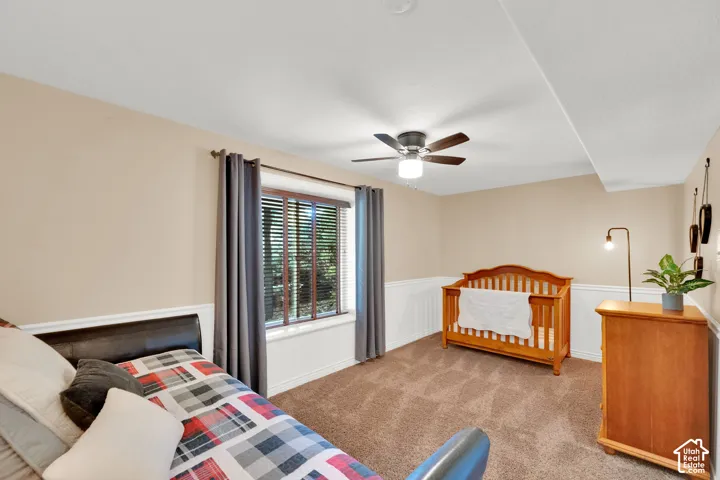 Wall-to-wall carpeting and neutral paint throughout
