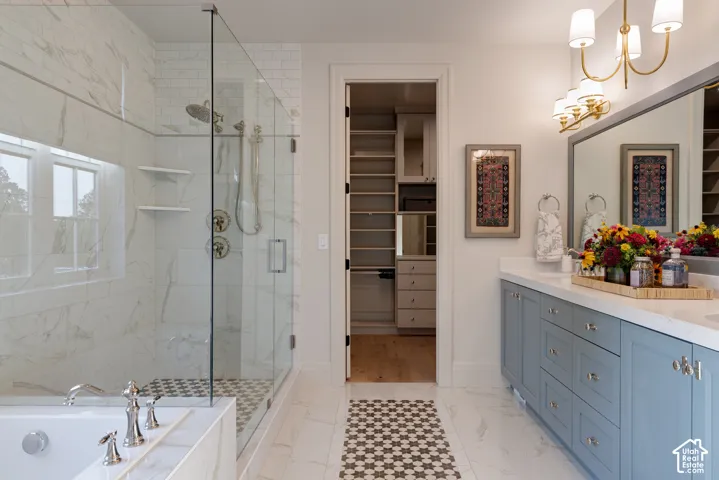 Shower with glass enclosure, white tile surround, and a built-in bench