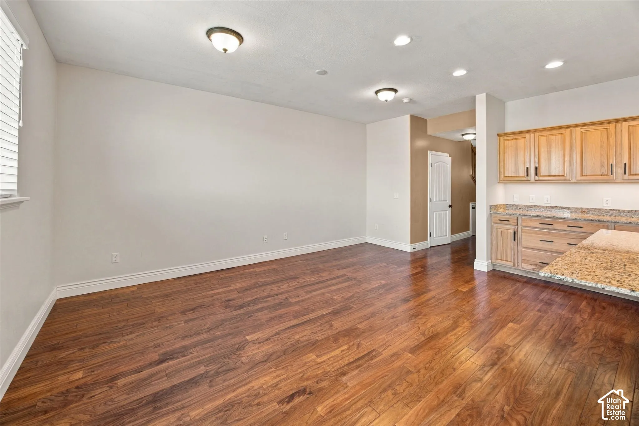 Wood-finish flooring throughout the main living space