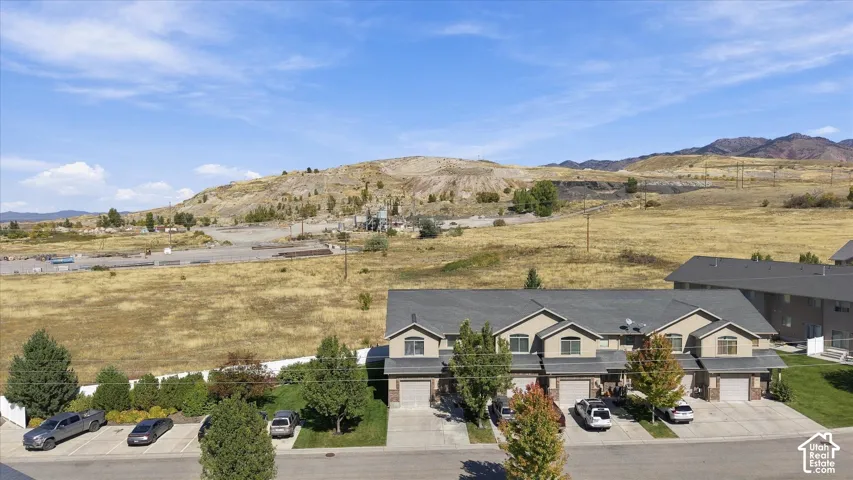 Townhome-style residences with attached garages and front-facing driveways