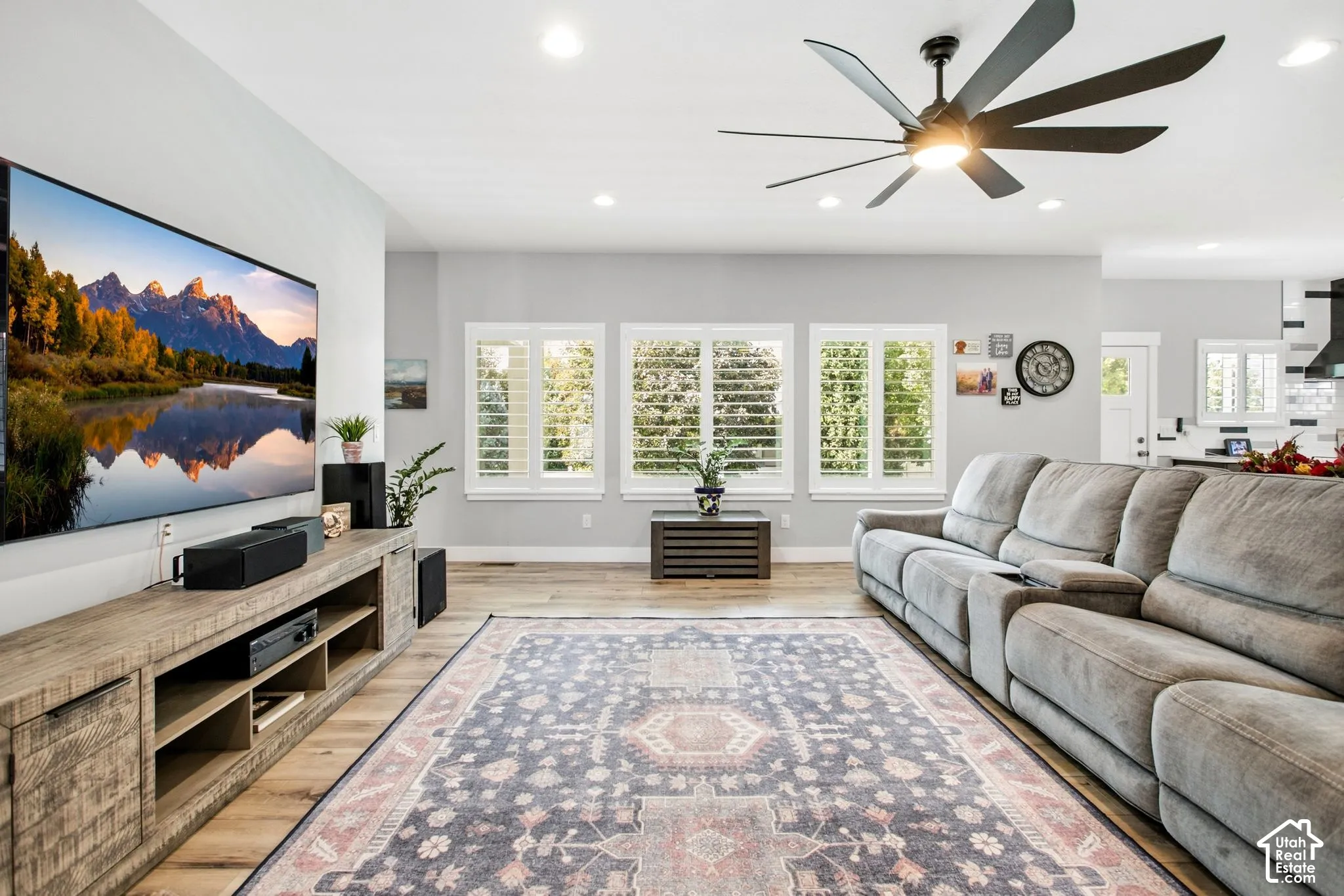Open concept living area with high ceilings