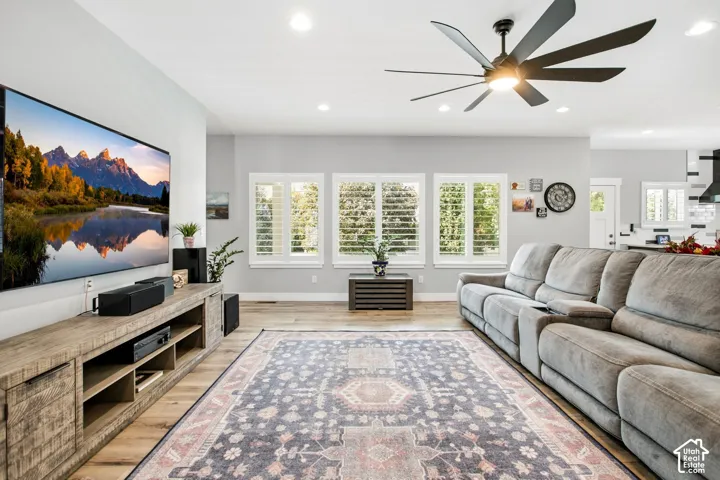 Open concept living area with high ceilings