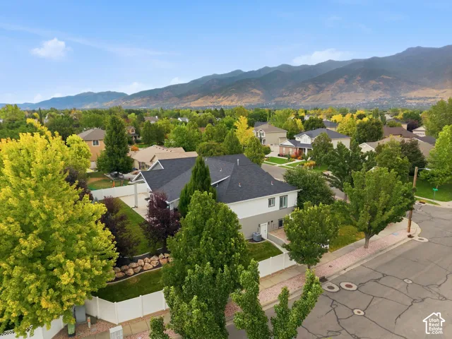 Aerial view of side/back of home showing separate side ADU entrance