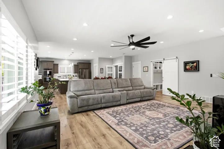 Open-concept living area with high ceilings