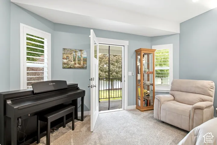 Primary suite with doorway to back covered patio