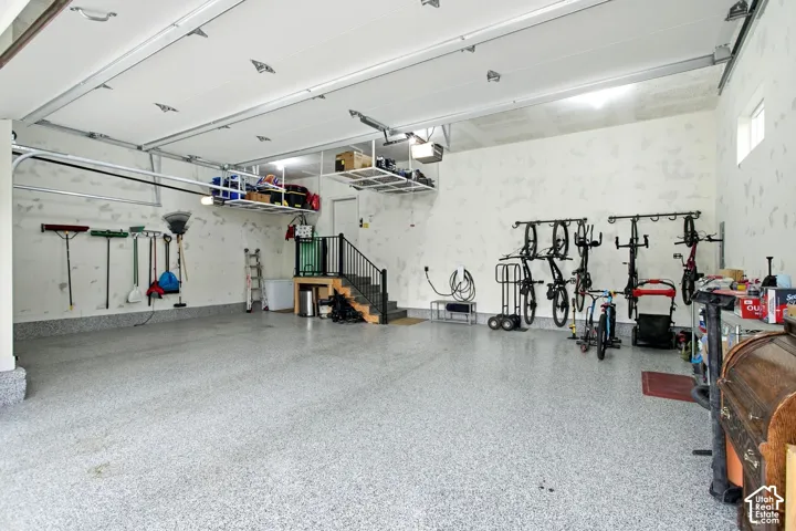 Spacious fully insulated 3 car garage with electric vehicle charging station