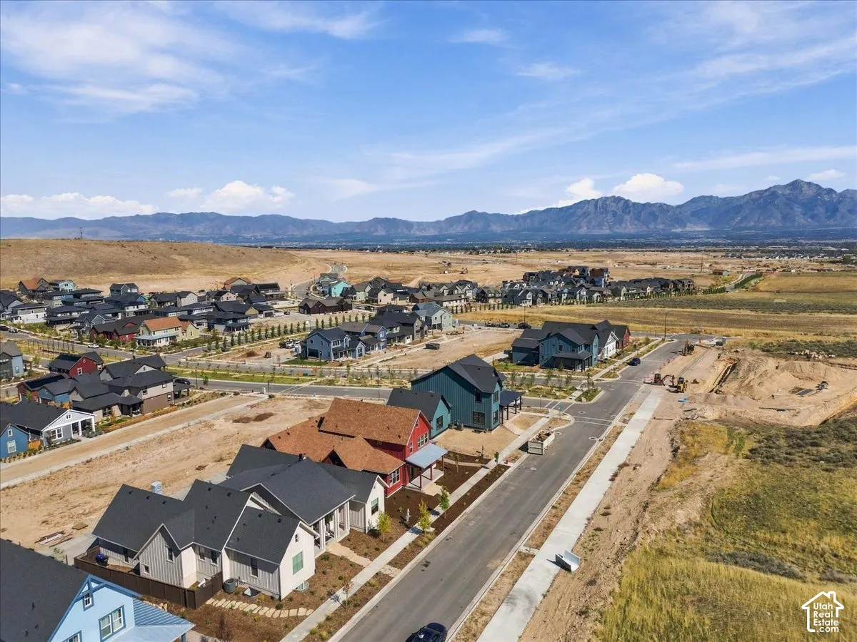 Residential development featuring paved roadways and newly constructed homes