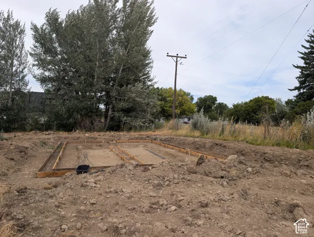 Excavated building site with wooden formwork and prepared ground