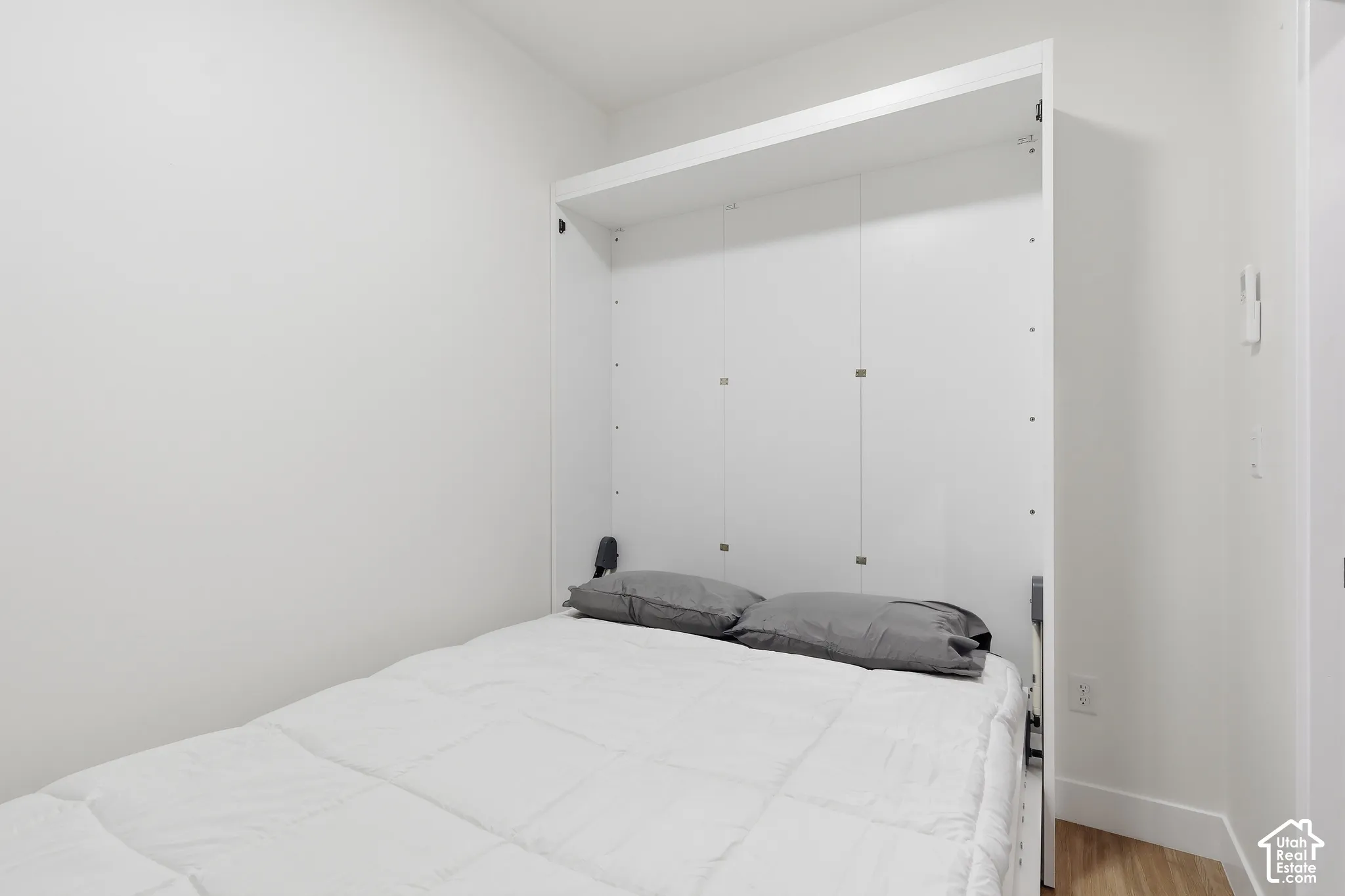 " Model  not for rent" White murphy bed -in wall bed with integrated storage