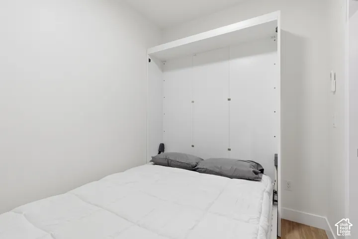 " Model  not for rent" White murphy bed -in wall bed with integrated storage