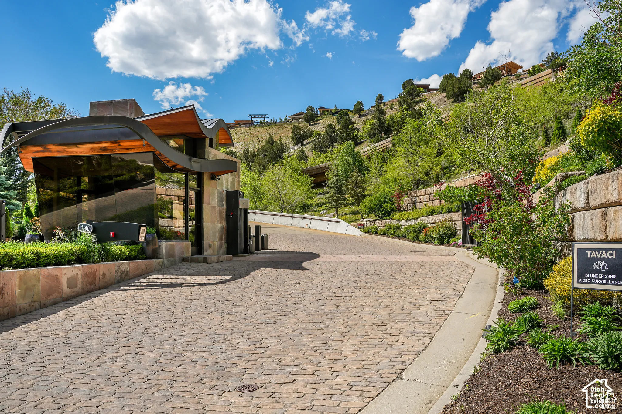 Paver driveway with a curved concrete border