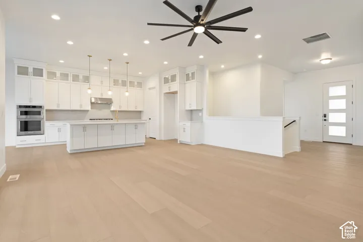 Light wood-finish flooring throughout
