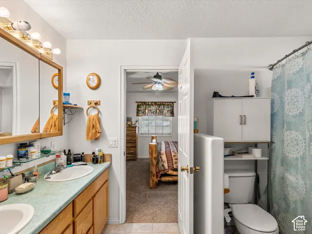Double vanity with undermount sinks and wood cabinetry