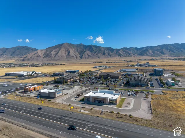 Aerial view of the property and surrounding area