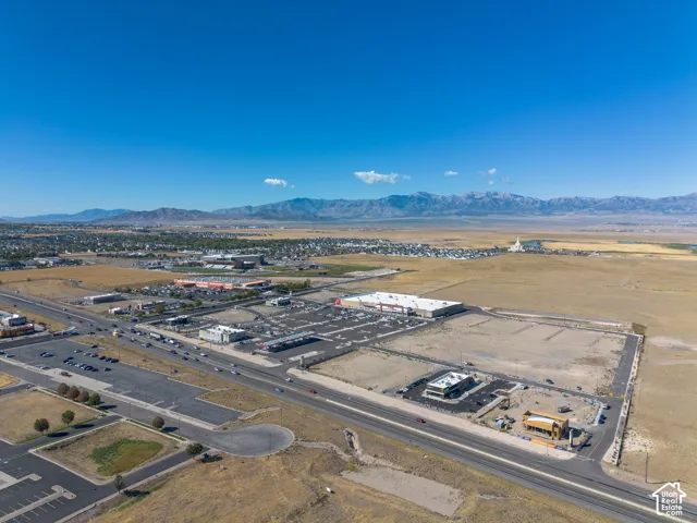 Aerial view of the property and surrounding area