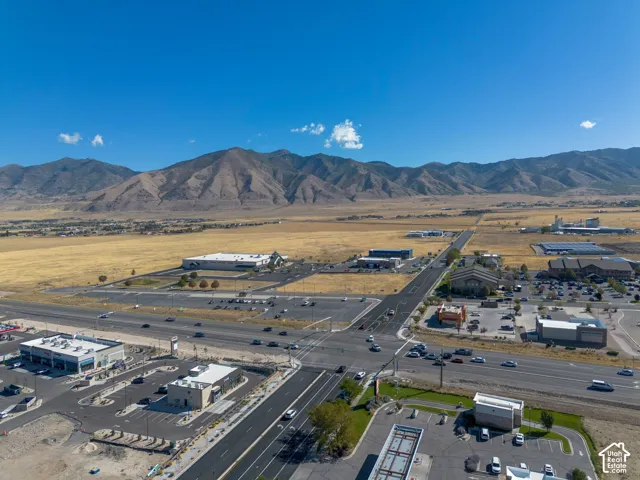 Aerial view of the property and surrounding area
