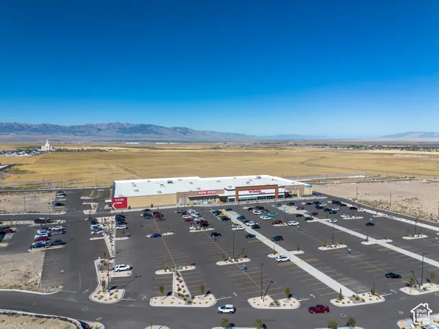 Aerial view of the property and surrounding area