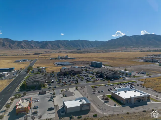 Aerial view of the property and surrounding area