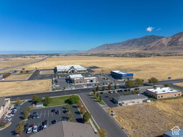 Aerial view of the property and surrounding area