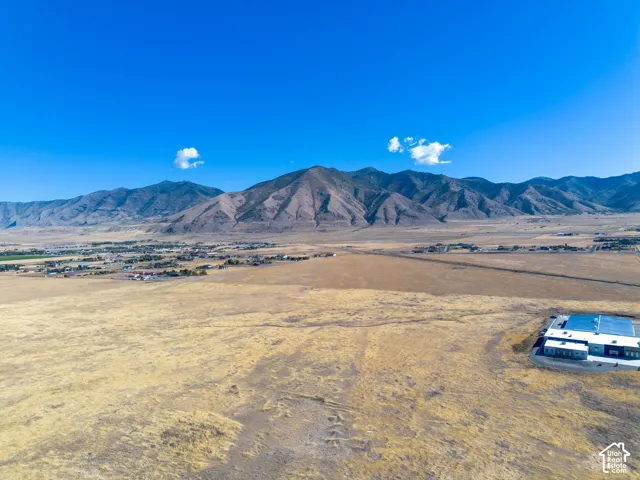 Aerial view of the property and surrounding area