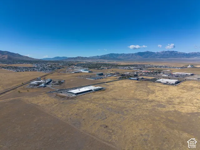 Aerial view of the property and surrounding area