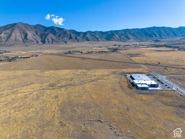 Aerial view of the property and surrounding area