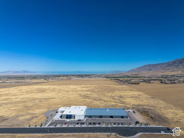 Aerial view of the property and surrounding area