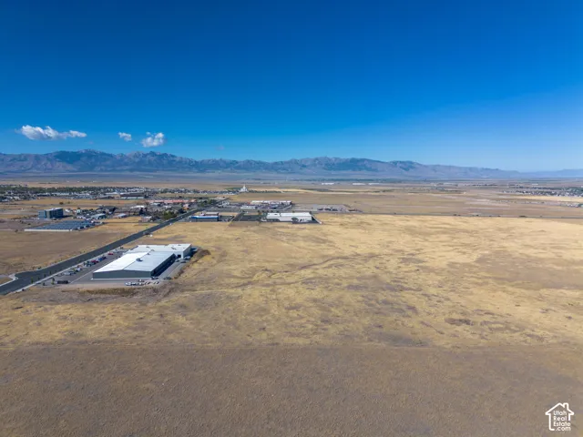 Aerial view of the property and surrounding area