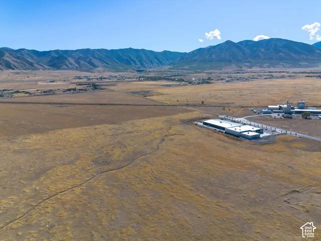 Aerial view of the property and surrounding area