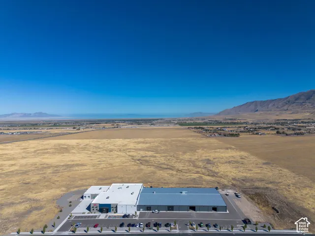 Aerial view of the property and surrounding area