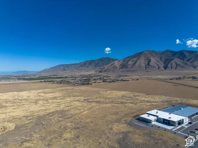 Aerial view of the property and surrounding area