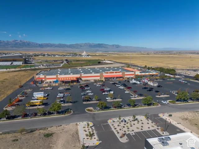 Aerial view of the property and surrounding area