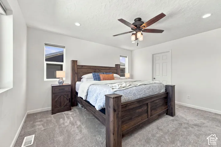 Recessed lighting and a ceiling fan with integrated lighting