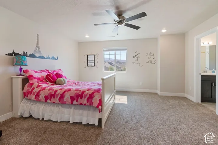 Spacious room with carpet flooring and light-toned walls