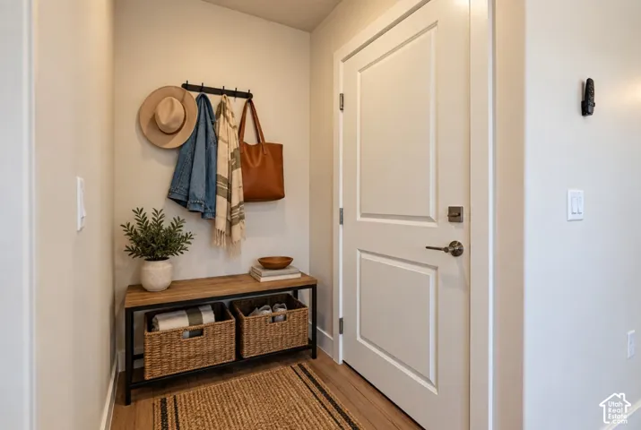 Wood-finish flooring with a multi-panel interior door