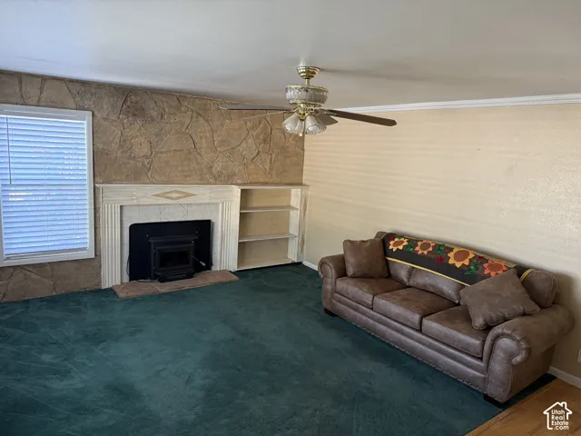 Stone accent wall with built-in fireplace and hearth