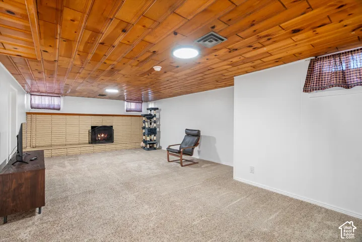 Wood-paneled ceiling with recessed lighting