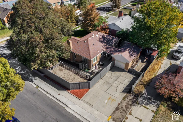Expansive concrete driveway and attached garage