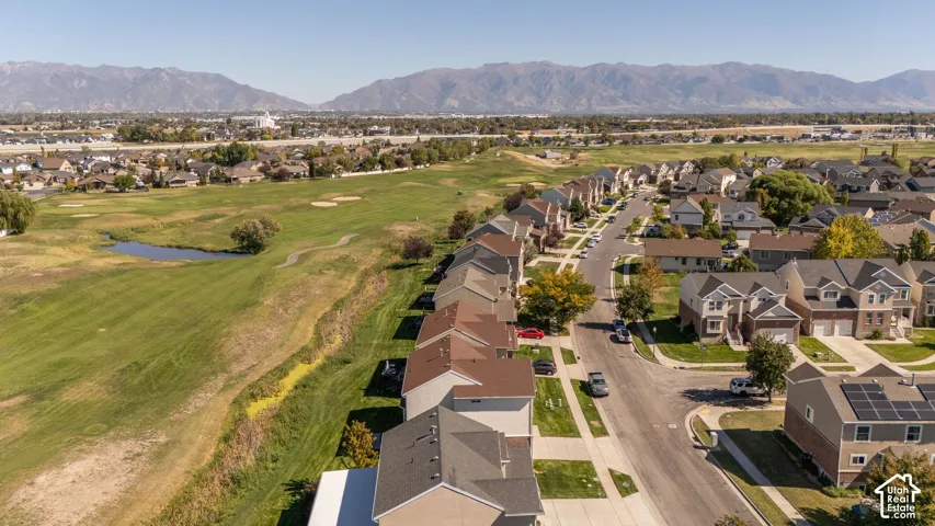 Panoramic neighborhood setting with mountain backdrop