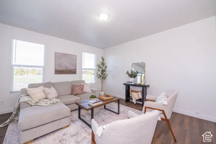 Wood-finish flooring with white walls and trim