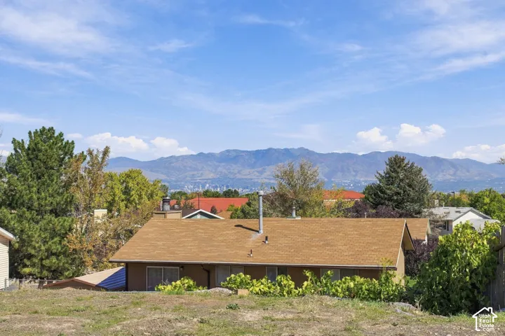 Backyard with the mountain view at night you can see downtown Salt Lake.
