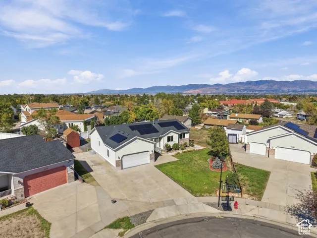 Neighborhood setting with mountain backdrop