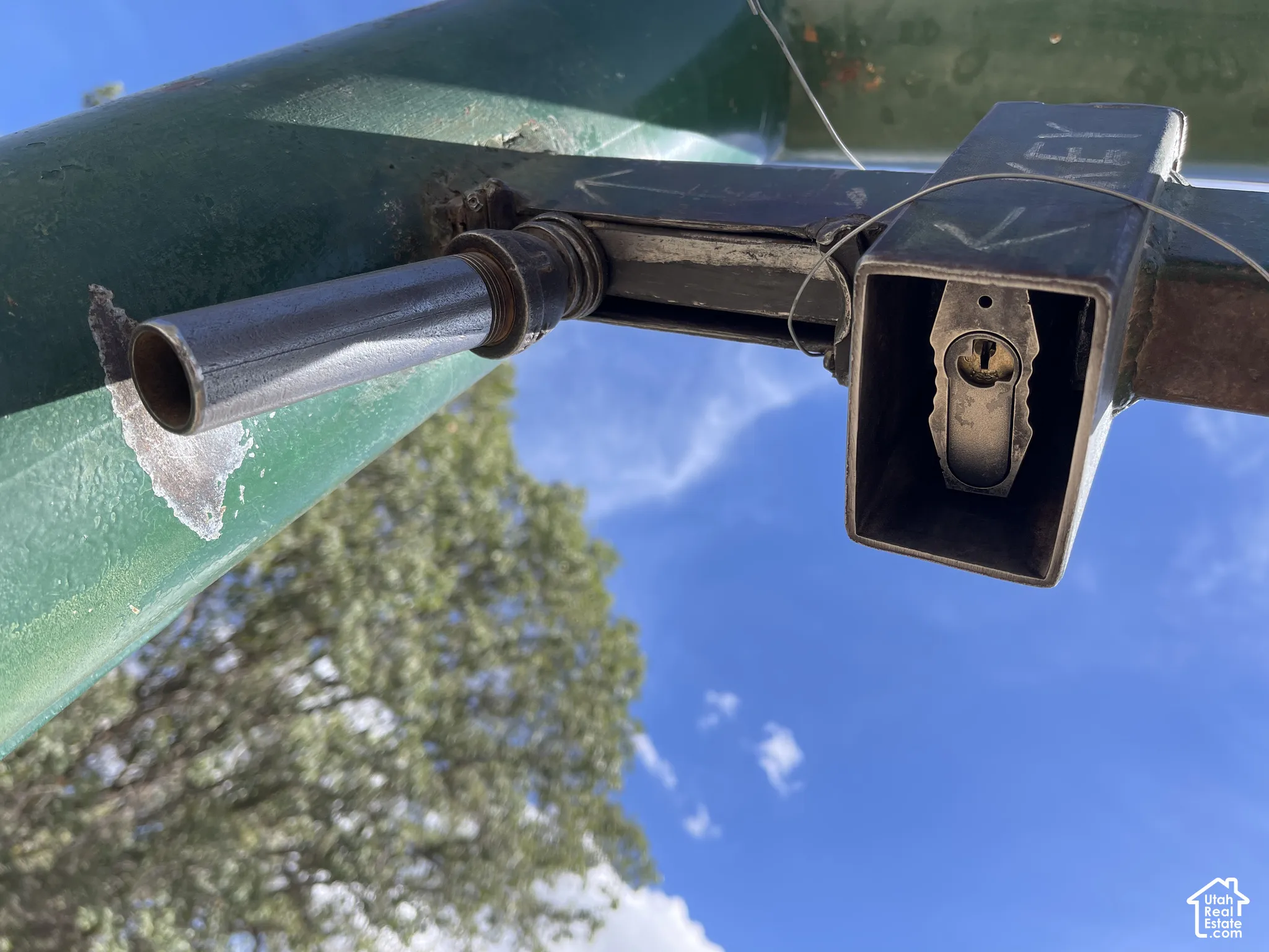This is the view of the lock from underneath. Once it is unlocked, slide the handle to the right.
