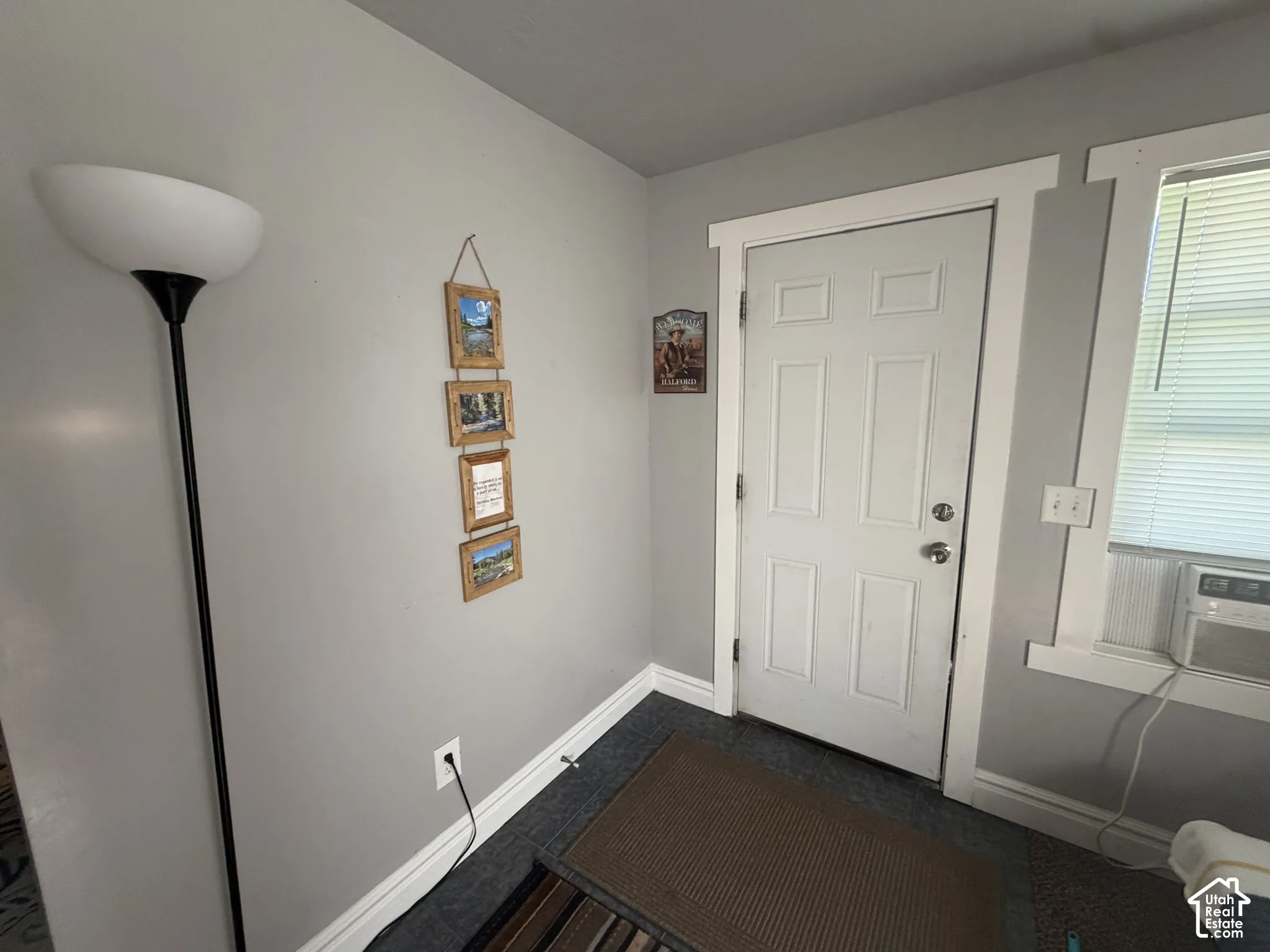 White paneled door with coordinating white trim