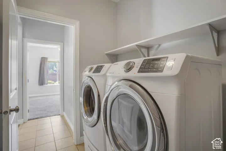 Tile flooring, white walls, and built-in shelving