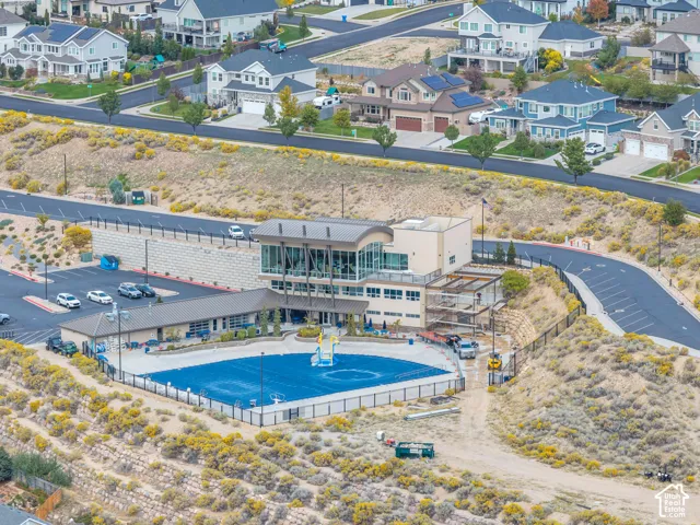 Traverse Mountain Club House facility featuring a covered swimming pool, a gym, and a large entertaining areas for large gatherings.