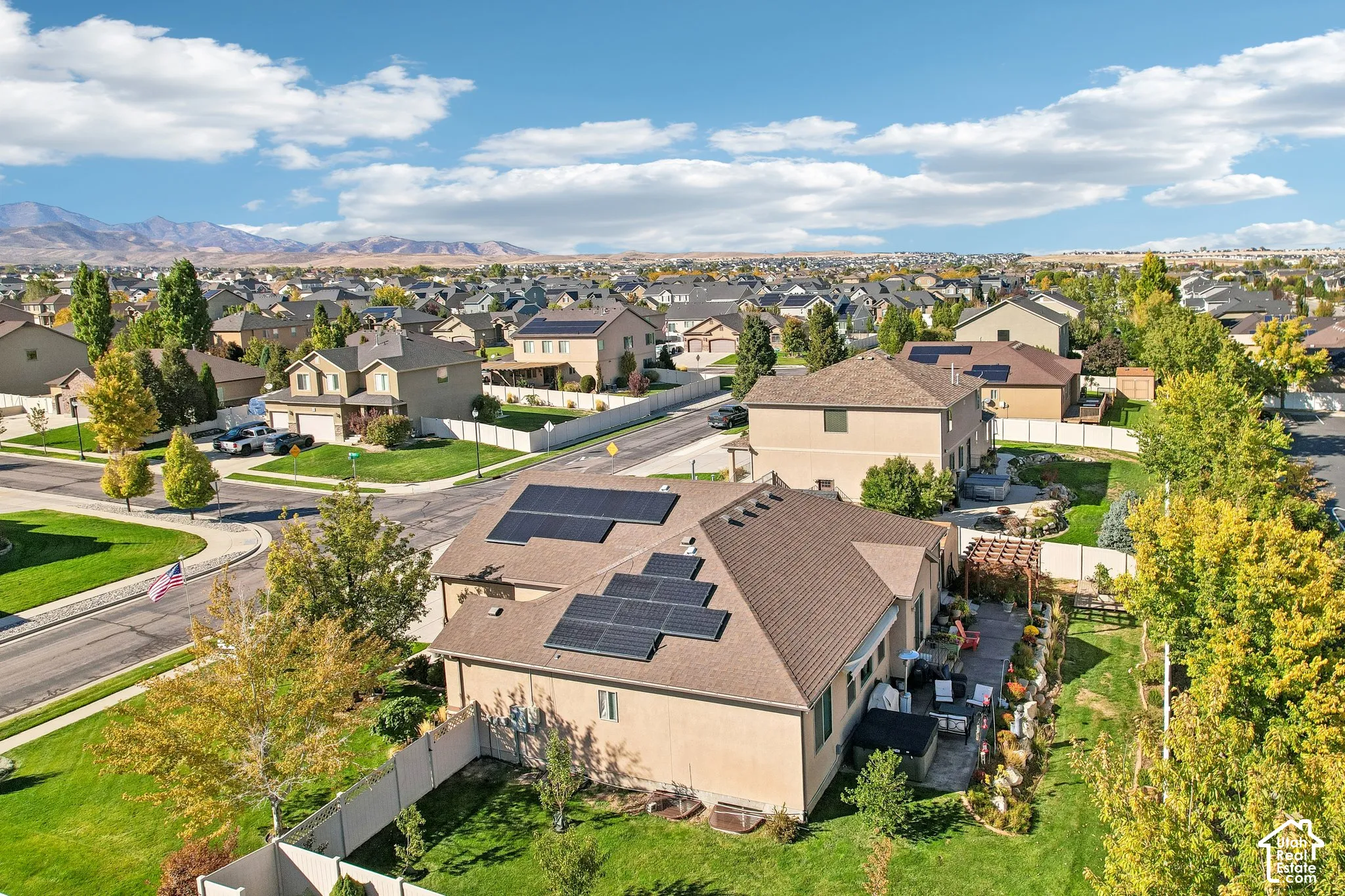 Expansive property featuring a private backyard, mature trees, pergola, and solar panels