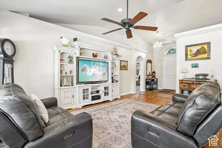 Vaulted ceiling featuring a ceiling fan, recessed lighting, and crown molding