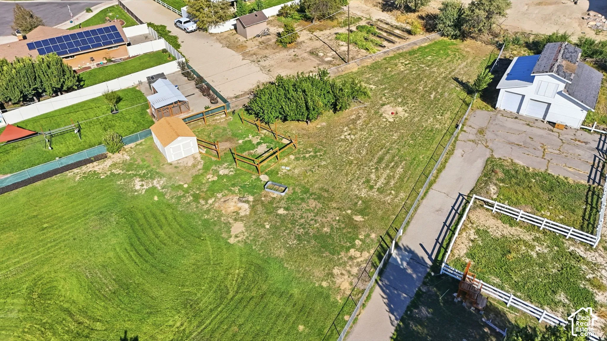 Expansive parcel with substantial green space and established trees