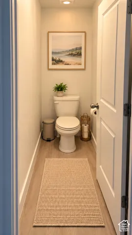 Recessed lighting fixture, light wood-finish flooring, and crisp white trim